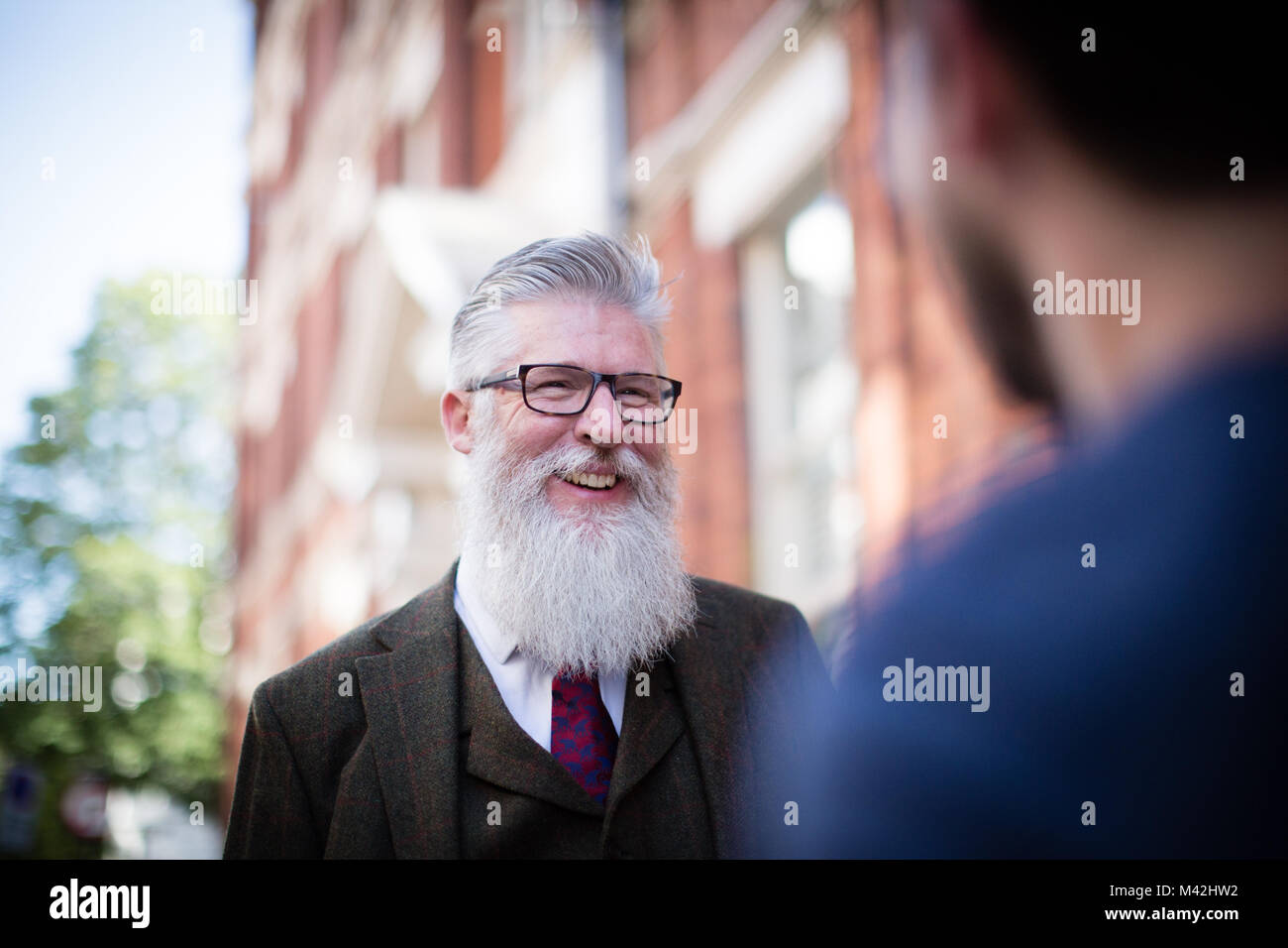 Senior male meeting friend Stock Photo