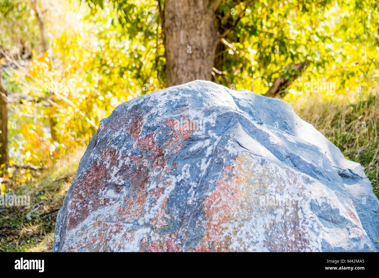 Big beautiful & colorful rock Stock Photo - Alamy