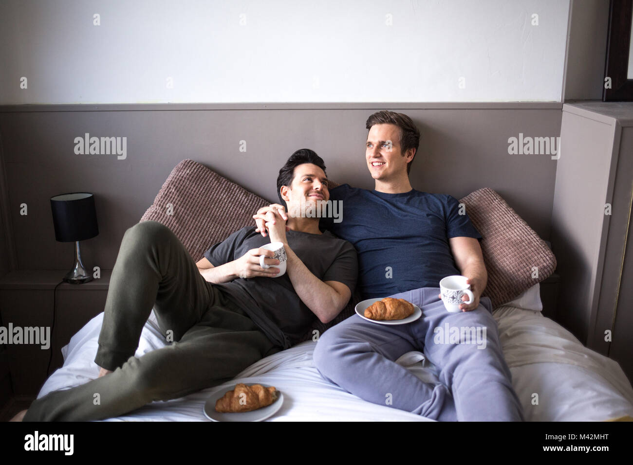 Gay men in bed hi-res stock photography and images - Alamy