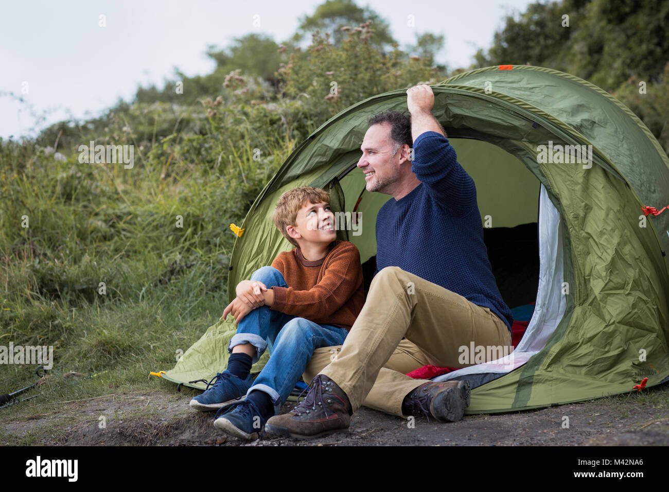 Father and Son camping together Stock Photo