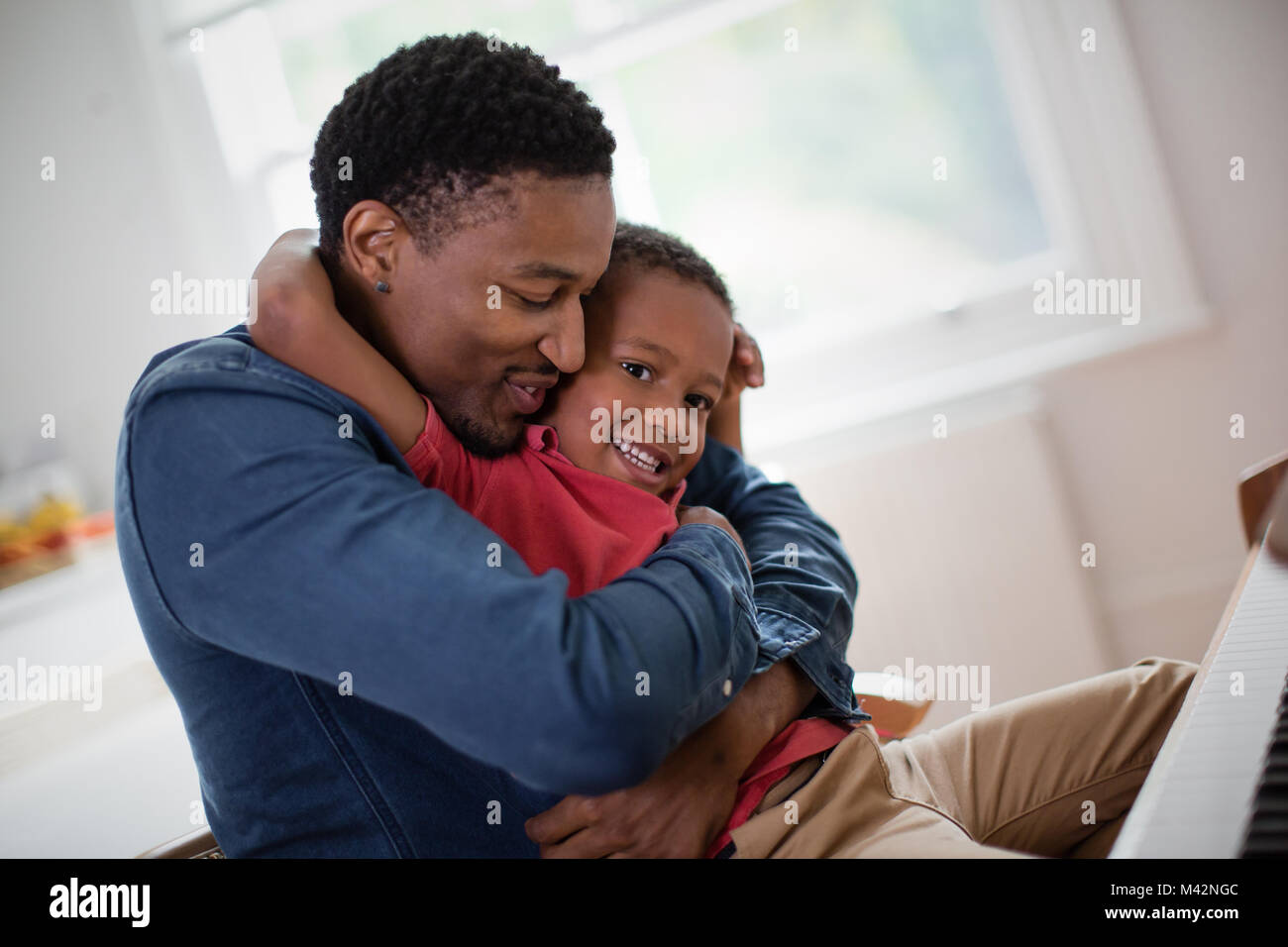 Father hugging Son Stock Photo