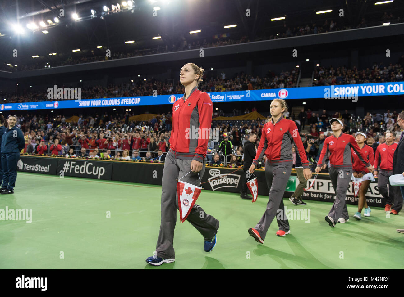 CLUJ NAPOCA, ROMANIA - FEBRUARY 10, 2018: The National Tennis Team of Canada entering the playground at the opening ceremony of Fed Cup World Group Pl Stock Photo