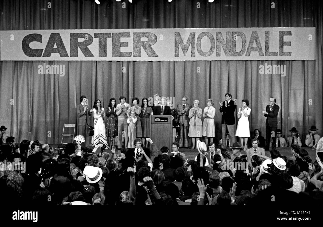 United States President-elect Jimmy Carter, surrounded by family, claims victory over US President Gerald R. Ford at an election night rally in Atlanta, Georgia on November 3, 1976.   Credit: Benjamin E. 'Gene' Forte / CNP /MediaPunch Stock Photo