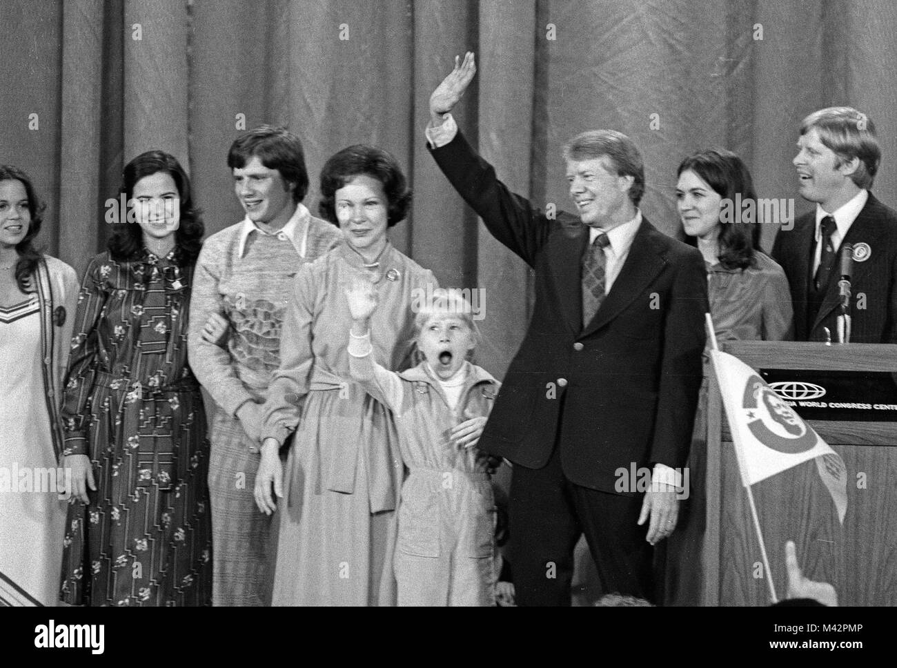 United States President-elect Jimmy Carter, his wife, Rosalynn, and daughter Amy, surrounded by family, wave to the crowd at an election night rally after he claimed victory over US President Gerald R. Ford in Atlanta, Georgia on November 3, 1976.   Credit: Benjamin E. 'Gene' Forte / CNP /MediaPunch Stock Photo