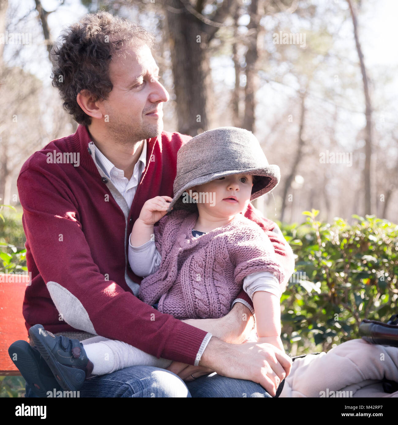 Father with cheerful child in the park. Stock Photo