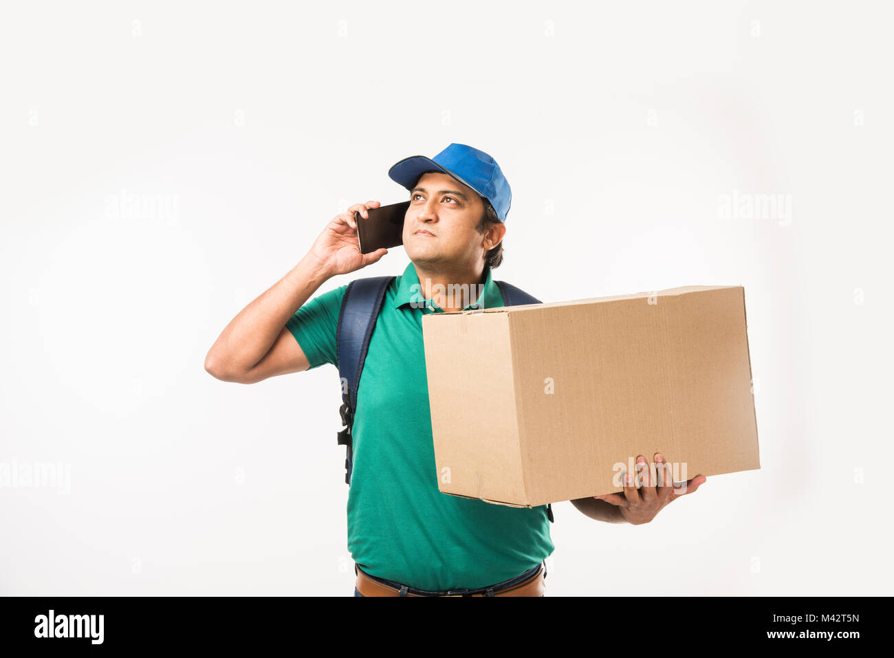 Male indian delivery boy hi-res stock photography and images - Alamy