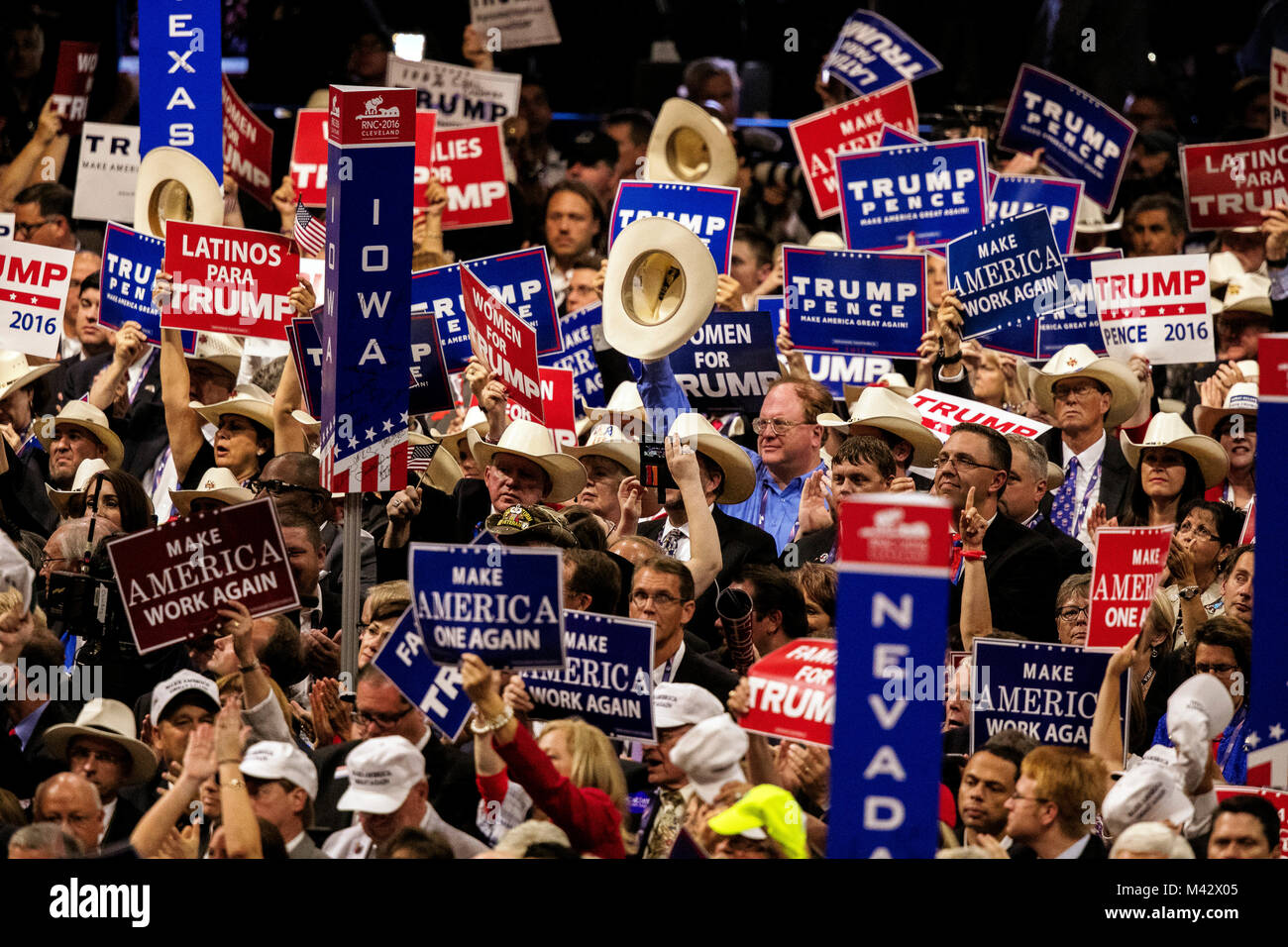 Cleveland, Ohio, USA,  July 21, 2016  Delegates from various states hold up signs in support of Presidential candidate Donald Trump at  the Republican National Convention in the Quicken Arena. Stock Photo