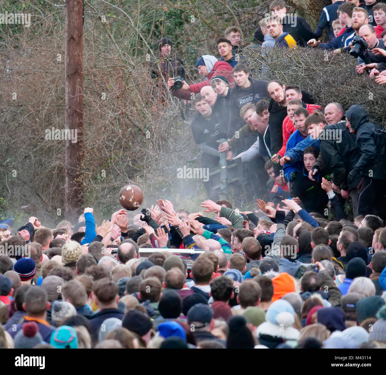 Ashbourne, UK. 13th February 2018. Ye Olde & Ancient Medieval hugball game is the forerunner to football. It's played between two teams, the Up'Ards & Down'Ards separated by the Henmore Brook river. The goals are 3 miles apart at Sturston Mill & Clifton Mill. Charles Cotton's poem Burlesque upon the Great Frost, dating from 1683, mentions this game at Ashbourne. He was the cousin of Aston Cockayne Baronet of Ashbourne, Derbyshire. Credit: Doug Blane/Alamy Live News Stock Photo