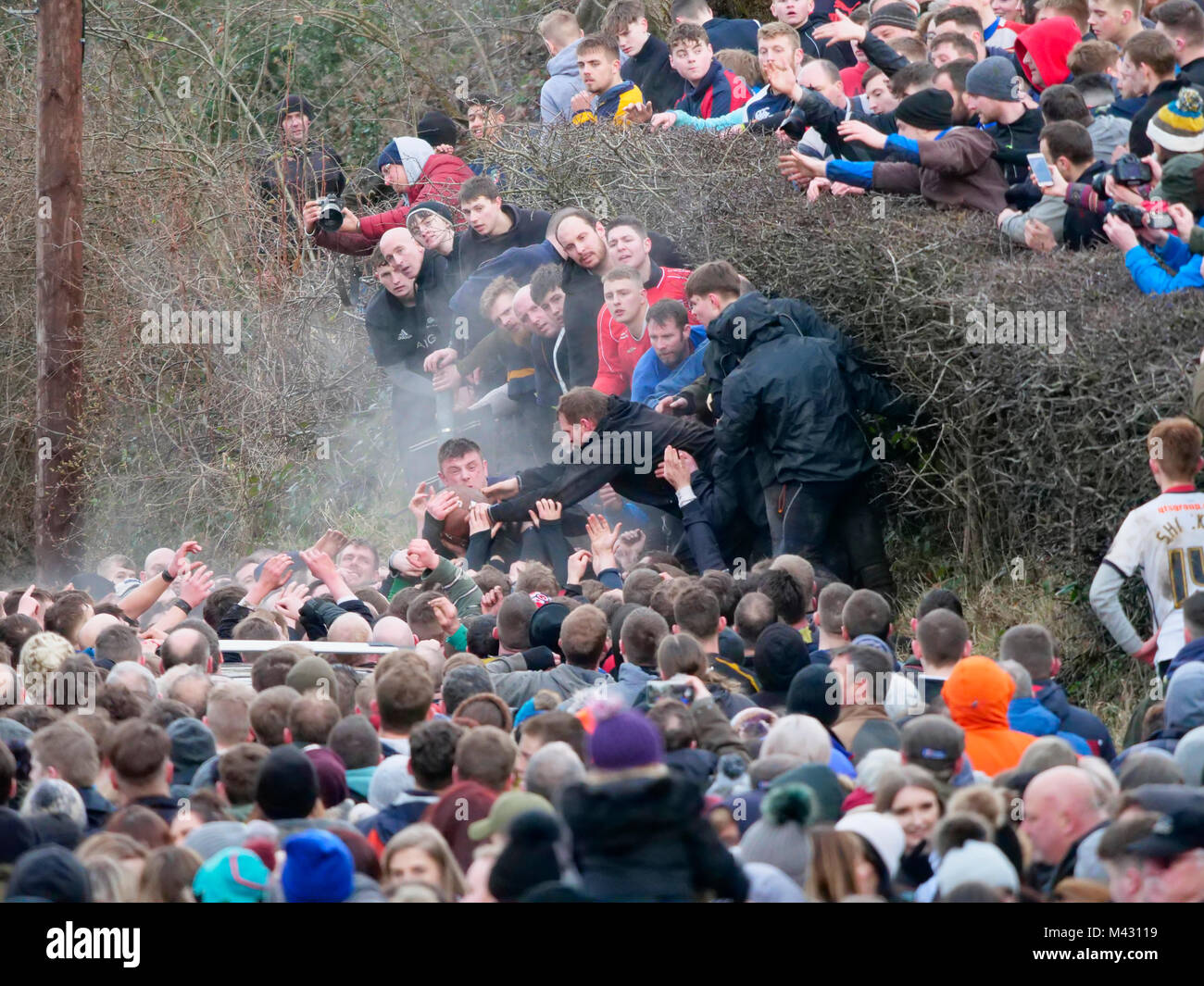 Ashbourne, UK. 13th February 2018. Ye Olde & Ancient Medieval hugball game is the forerunner to football. It's played between two teams, the Up'Ards & Down'Ards separated by the Henmore Brook river. The goals are 3 miles apart at Sturston Mill & Clifton Mill. Charles Cotton's poem Burlesque upon the Great Frost, dating from 1683, mentions this game at Ashbourne. He was the cousin of Aston Cockayne Baronet of Ashbourne, Derbyshire. Credit: Doug Blane/Alamy Live News Stock Photo