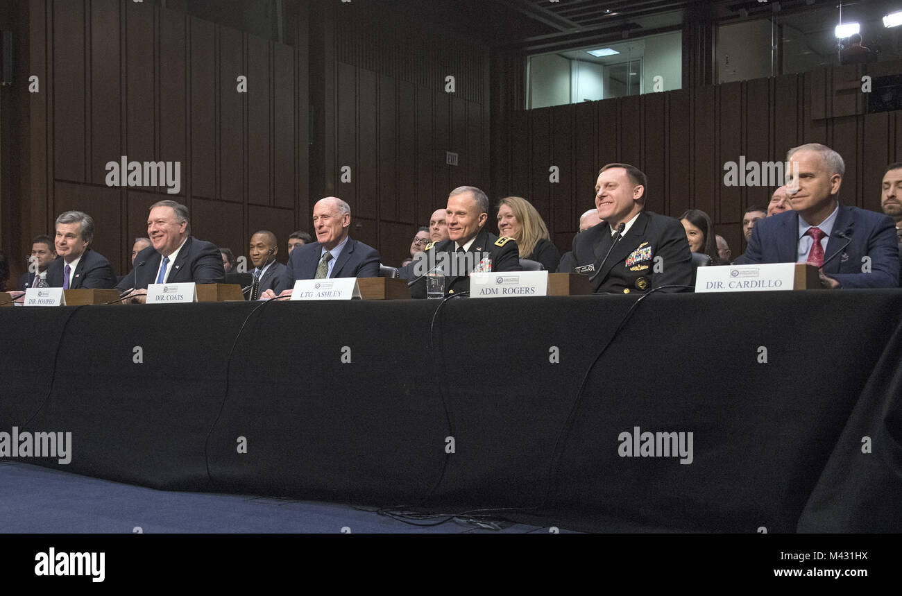 February 13, 2018 - Washington, District of Columbia, United States of America - From left to right: Federal Bureau of Investigation (FBI) Director Christopher Wray, Central Intelligence Agency (CIA) Director Mike Pompeo, Director of National Intelligence (DNI) Dan Coats, Defense Intelligence Agency (DIA) Director Lieutenant General Robert P. Ashley, Jr., United States Army, National Security Agency (NSA) Director Admiral Michael S. Rogers, United States Navy, and National Geospatial-Intelligence Agency (NGA) Director Robert Cardillo, appear together as they testify before the United States S Stock Photo