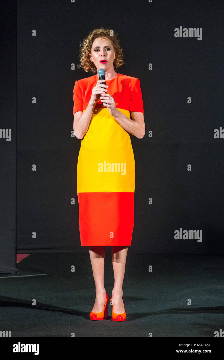 New York, USA, 13 Feb 2018. Spanish designer Agatha Ruiz de la Prada wears  a dress with the colors of the Spanish national flag as she makes a plea  for national unity