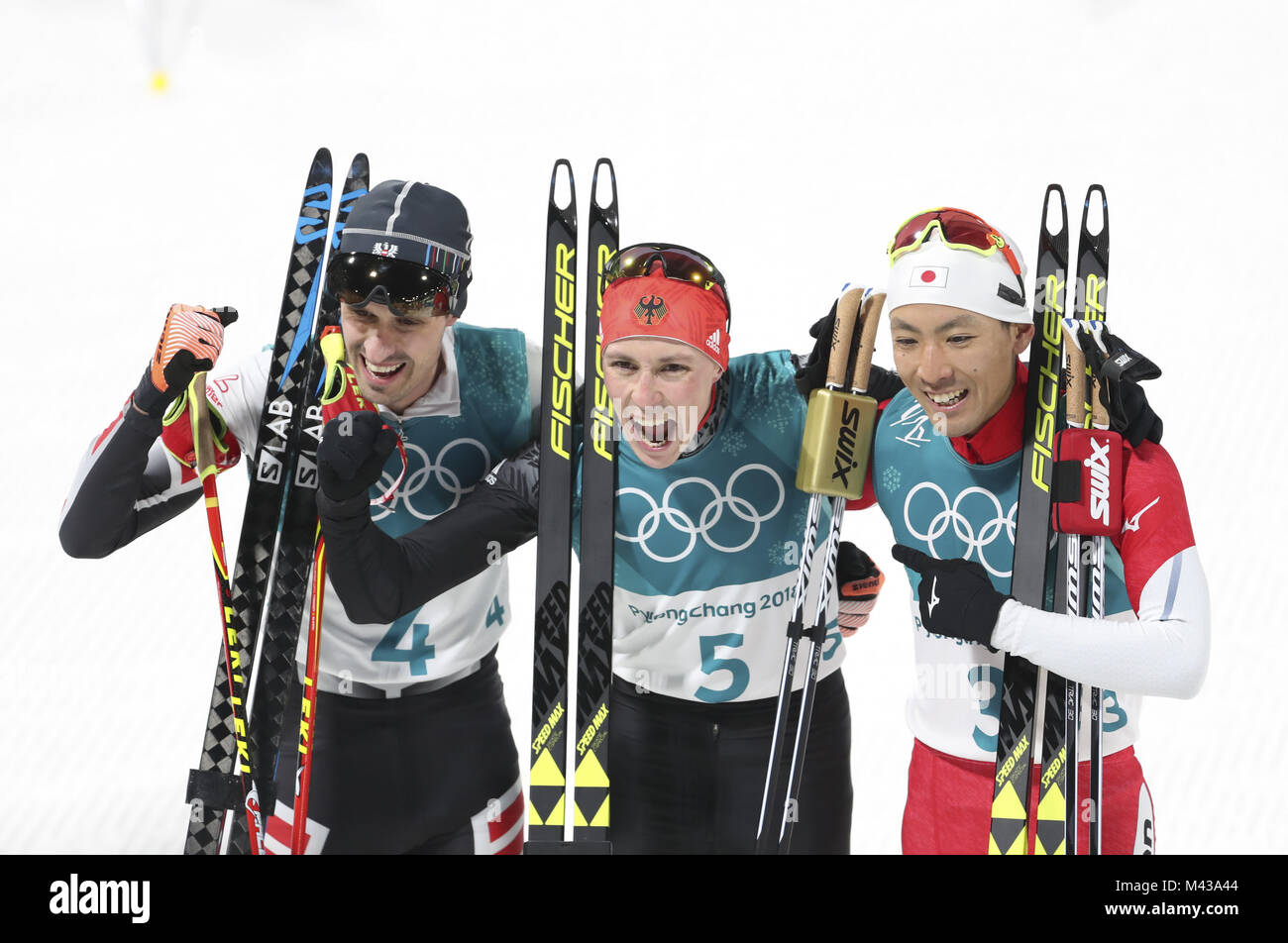 Pyeongchang, South Korea. 14th Feb, 2018. Gold medalist Eric Frenzel (C)from Germany, silver medalist Akito Watabe (R) from Japan and Lukas Klapfer from Austria pose for photos after finishing individual gundersen NH/10KM event of Nordic Combined at 2018 PyeongChang Winter Olympic Games at Alpensia Biathlon Centre, PyeongChang, Feb. 14, 2018. Credit: Bai Xuefei/Xinhua/Alamy Live News Stock Photo