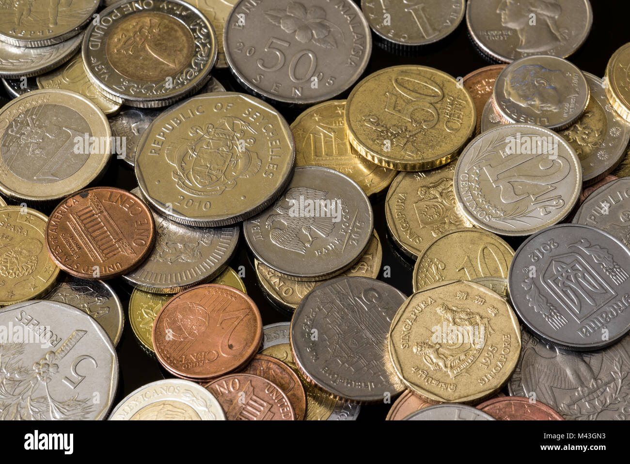 Coins from different countries. Nice money background Stock Photo - Alamy