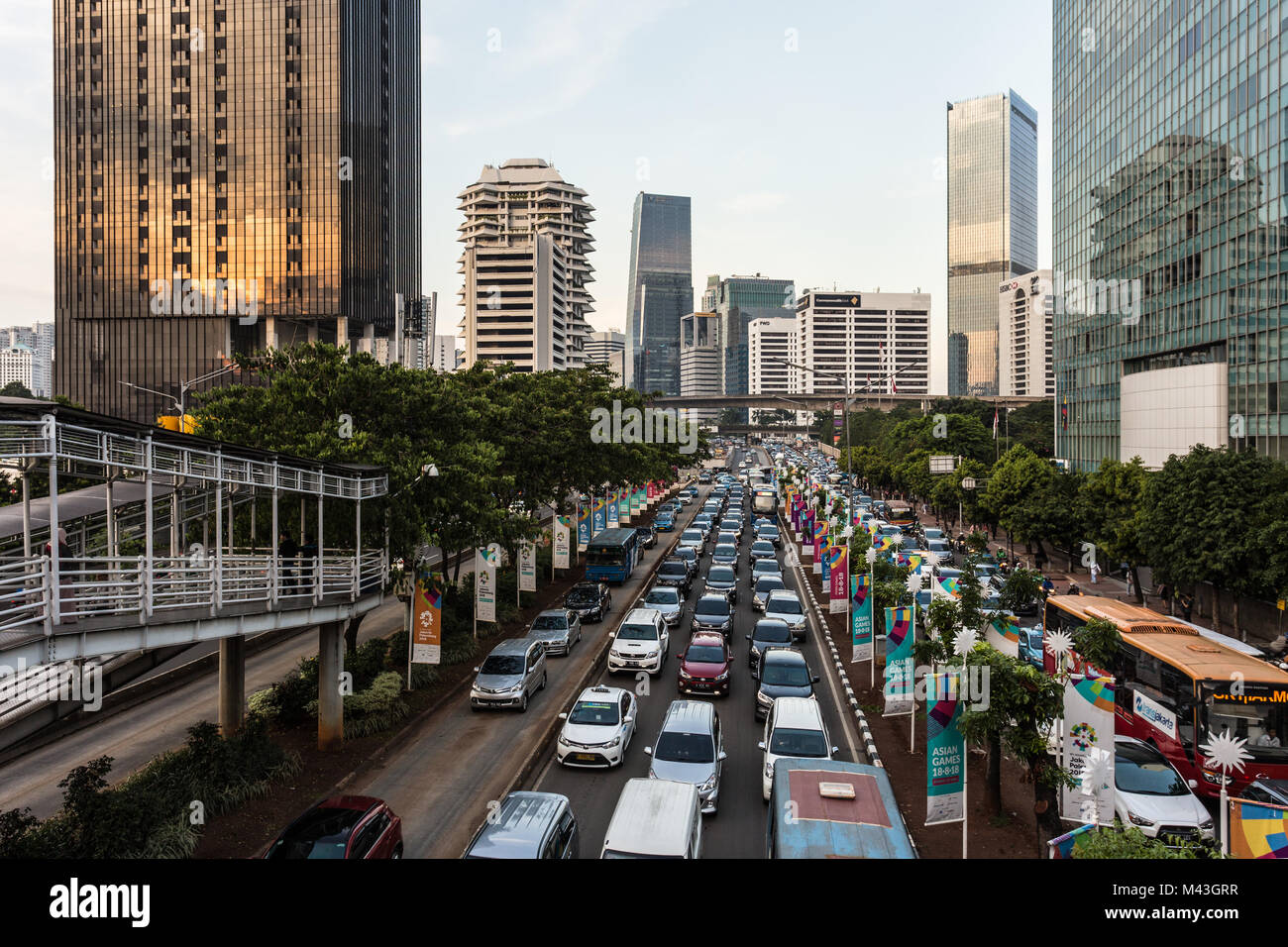 Jakarta, Indonesia - October 20 2017: Cars, buses and other vehicules stuck in a traffic jam on Sudirman street in Jakarta business district in Indone Stock Photo