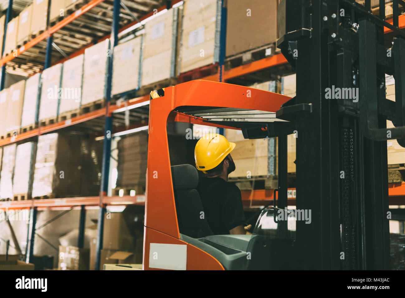 Logistics warehouse loader unloading delivery hi-res stock photography ...