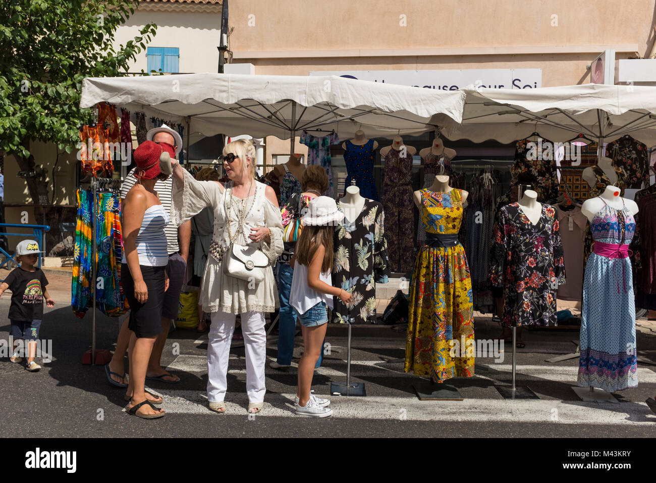 Ladies' dress stall on Sunday Market, Sausset les Pins, Bouces du Rhone, PACA, France Stock Photo