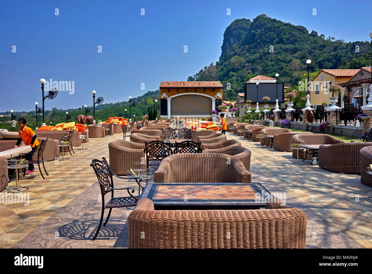 Open air dining. restaurant terrace with wicker furniture. Thailand Southeast Asia Stock Photo