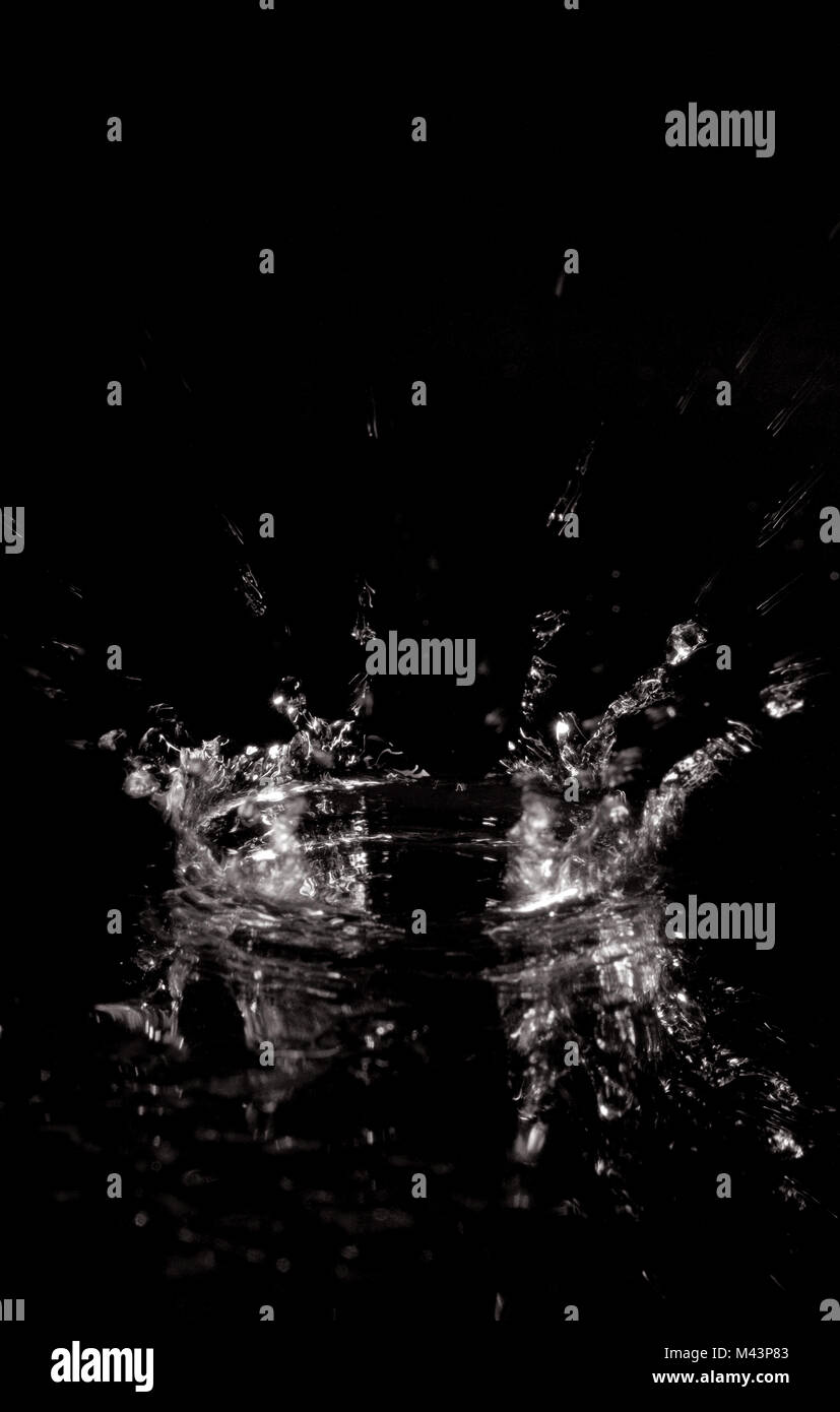 splash of water isolated on black Stock Photo - Alamy