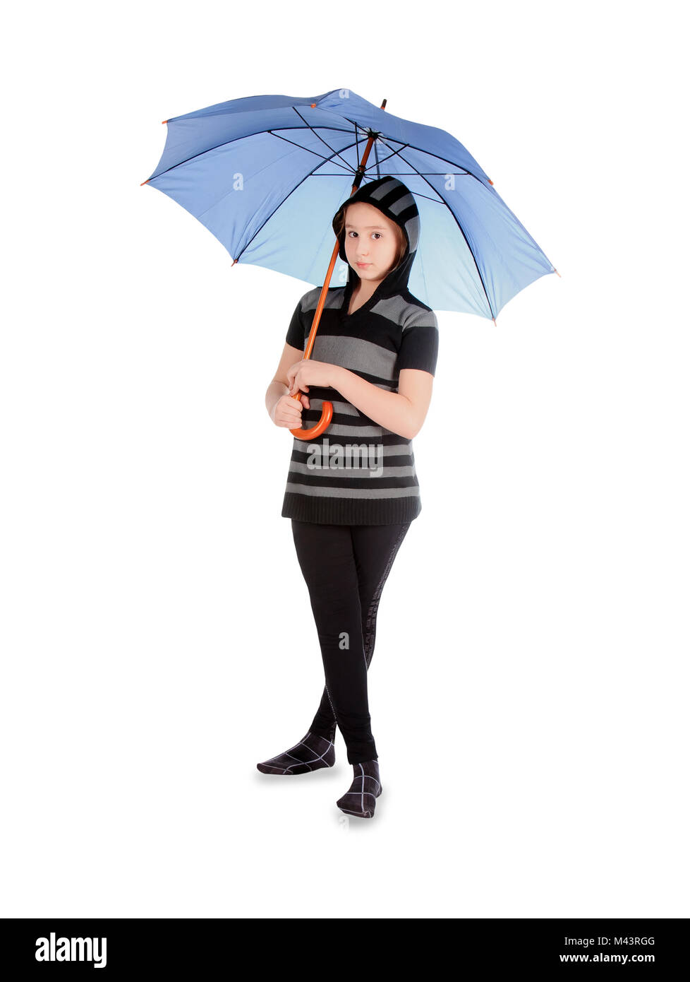 Happy girl holding umbrella hi-res stock photography and images - Alamy