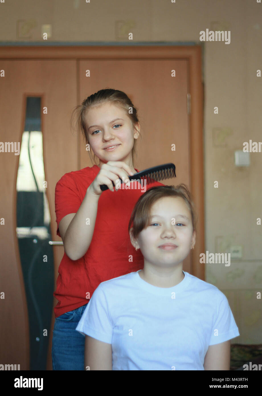 Teen hairbrush hi-res stock photography and images - Alamy