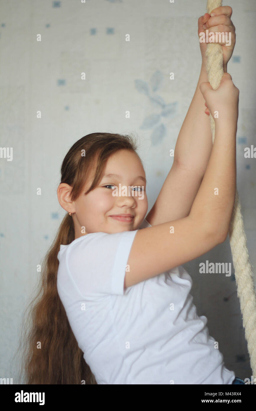 Cute Teenager Girl 12 Years Old Posing Near Gymnastic Rope Stock