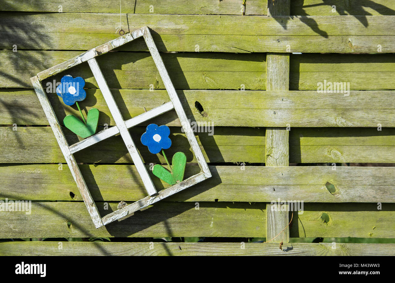 picture of a fence between two garden - vintage lo Stock Photo - Alamy
