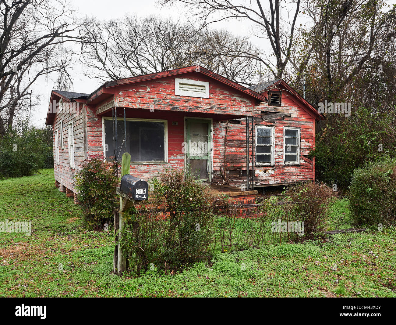 Vacant, empty or abandoned house or home in a poor area showing the level of poverty in the inner urban area of Montgomery Alabama, USA. Stock Photo