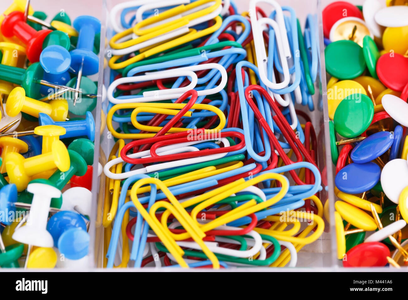 Set of colorful pins and clips closeup picture Stock Photo - Alamy