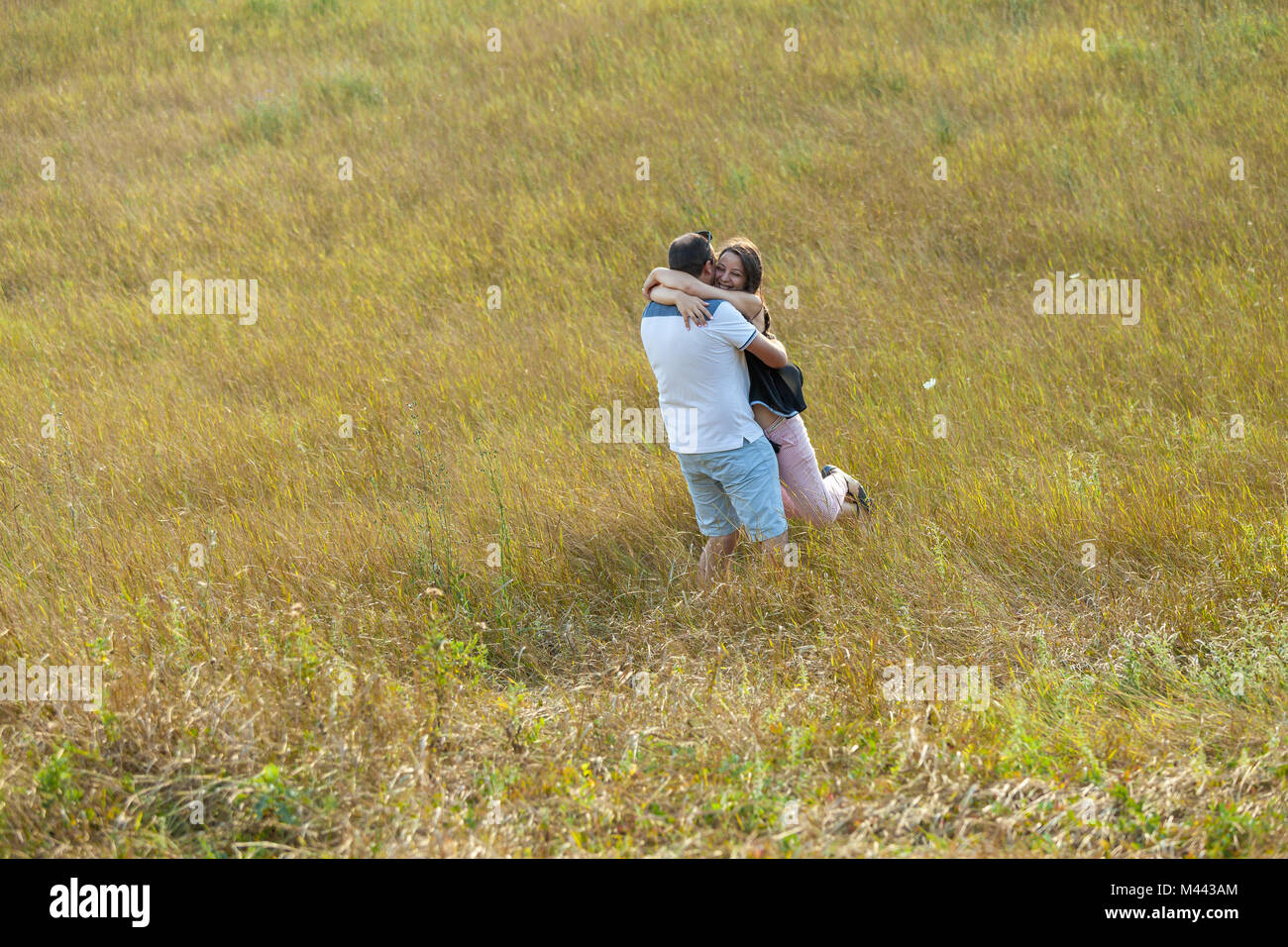 lonely and young couple in love on a trip in a nature reserve. Abruzzo, Italy Stock Photo