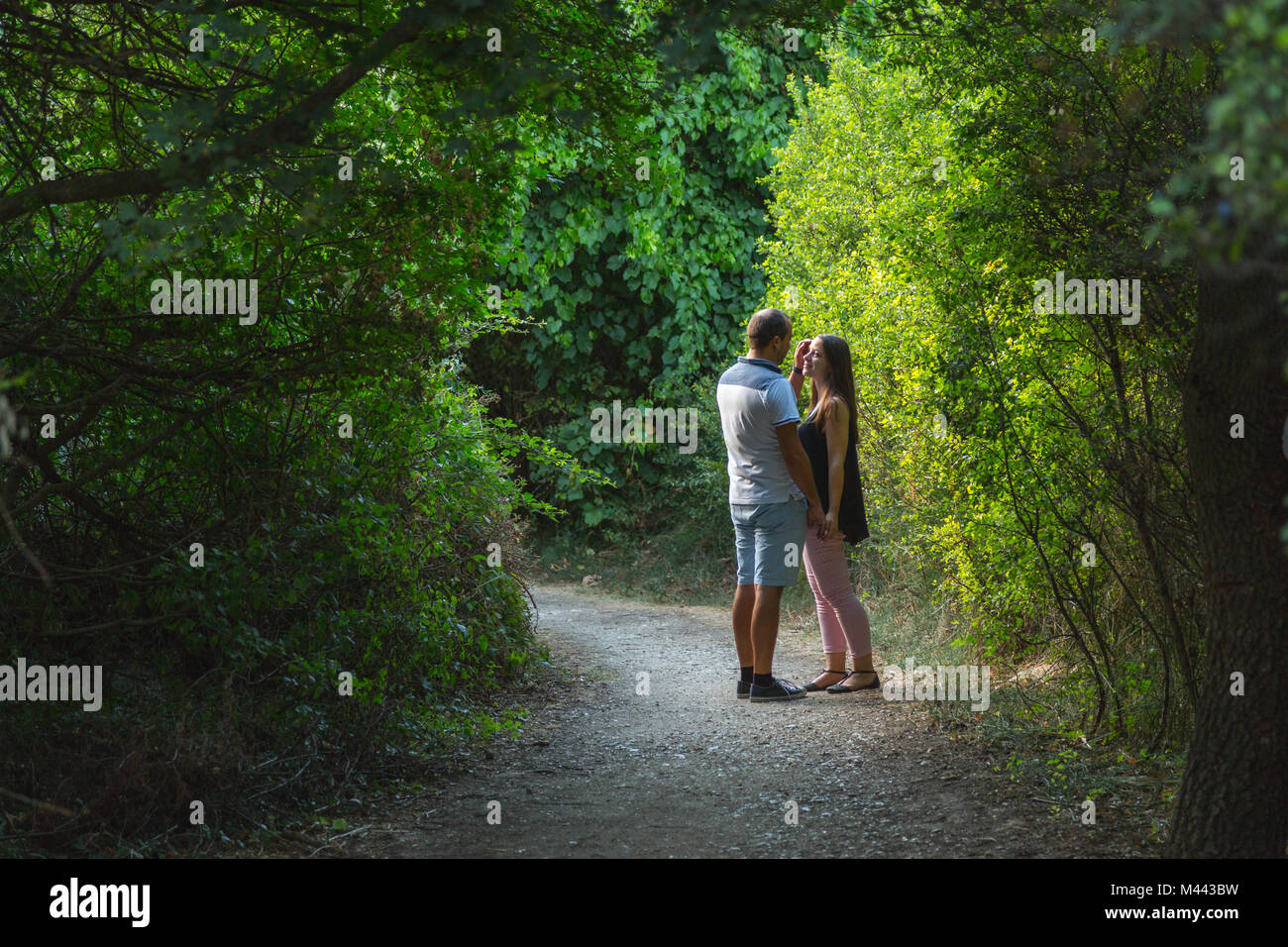 lonely and young couple in love on a trip in a nature reserve. Abruzzo, Italy Stock Photo