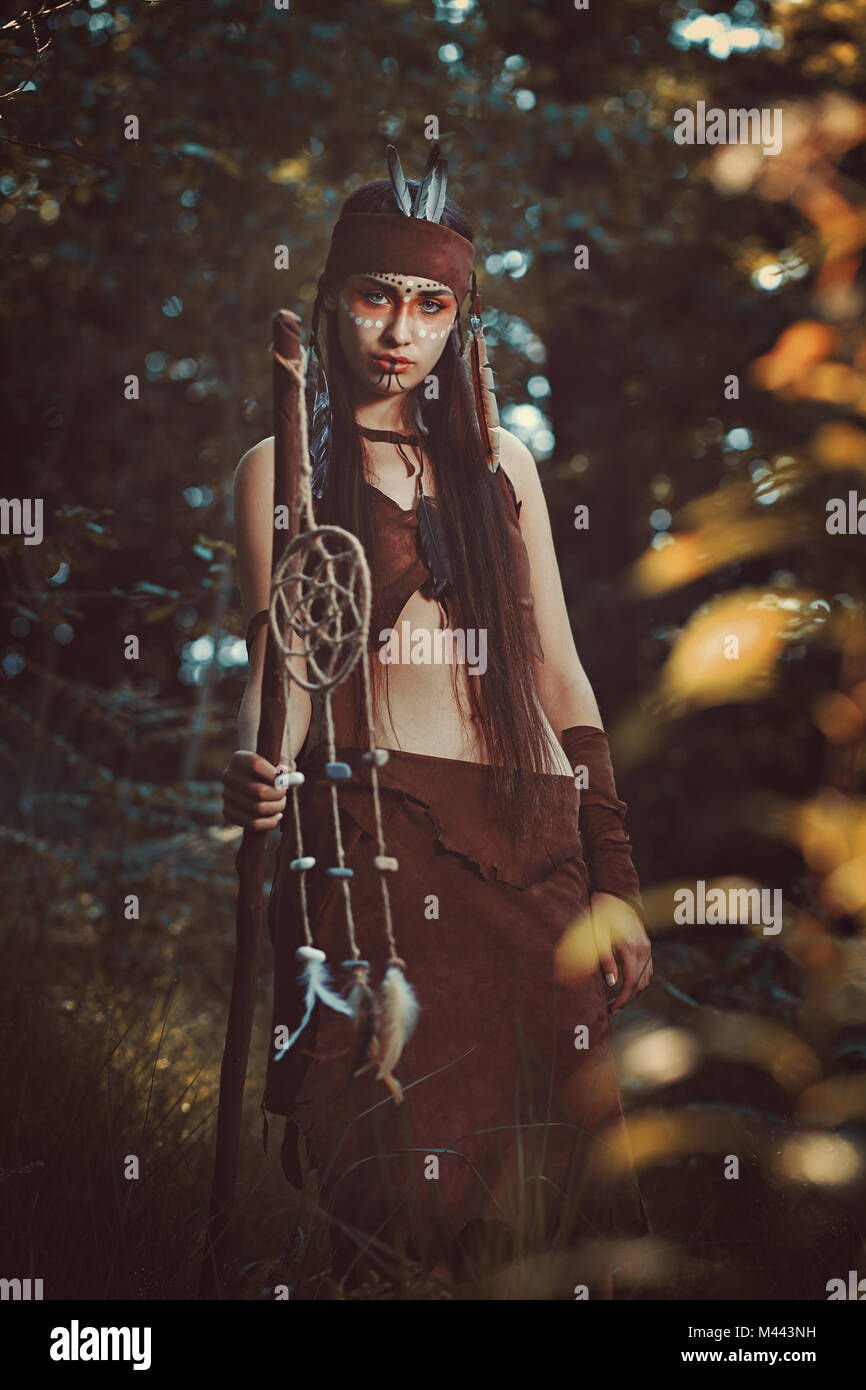 Beautiful female shaman. Colorful woods Stock Photo Alamy