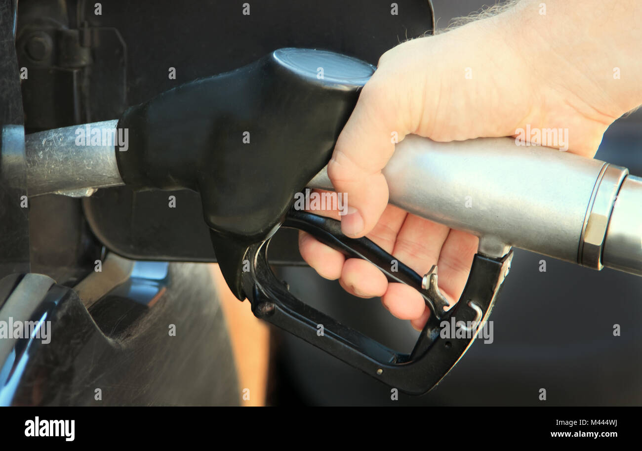 Refilling the car with unleaded petrol Stock Photo