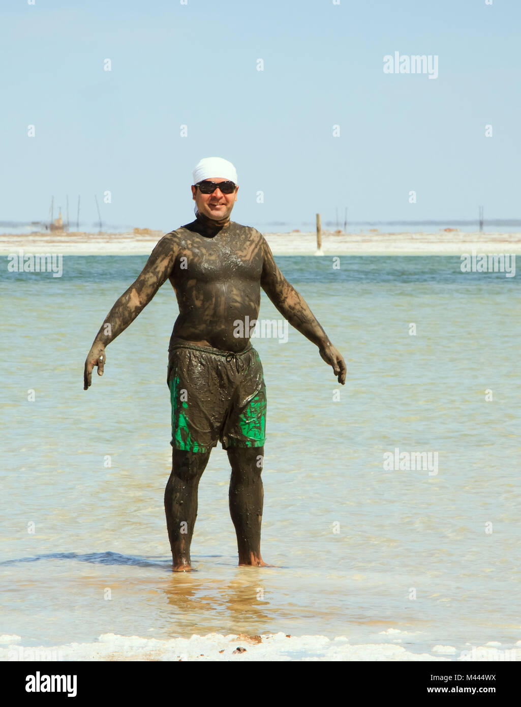 Man in mud bath hi-res stock photography and images - Alamy