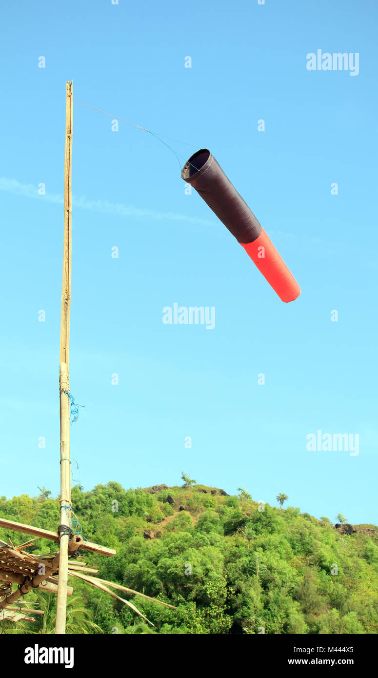 Old wind sock in jungle show direction of wind Stock Photo