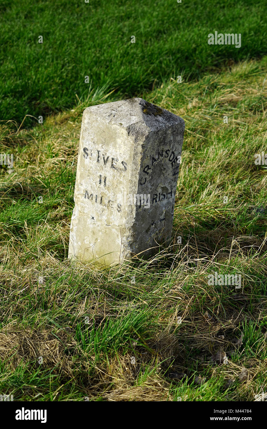Milestone on the B1040 between Abbotsley and Great Gransden Stock Photo