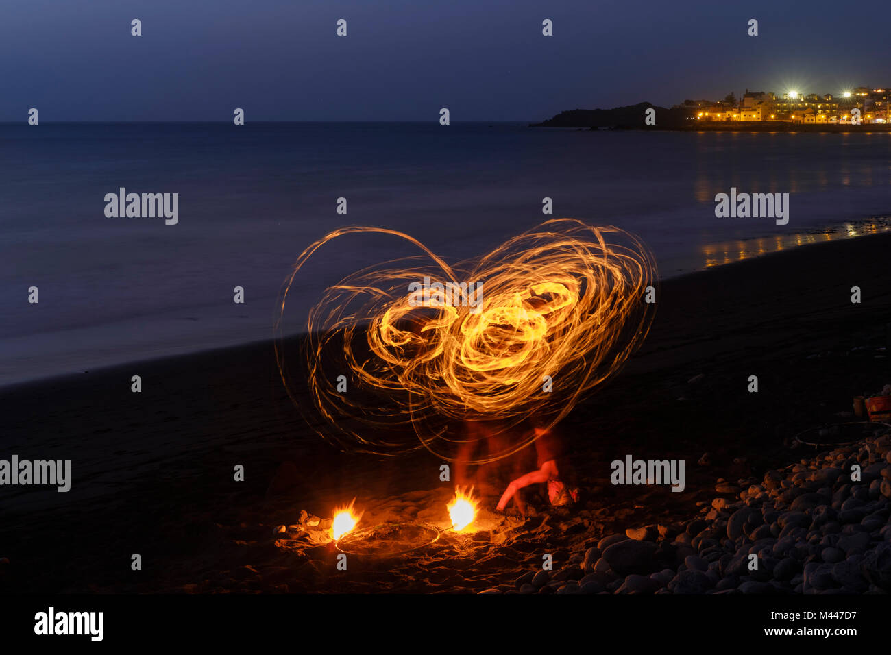 Night shot,fire dance,dance with torches on the beach,La Playa,Valle