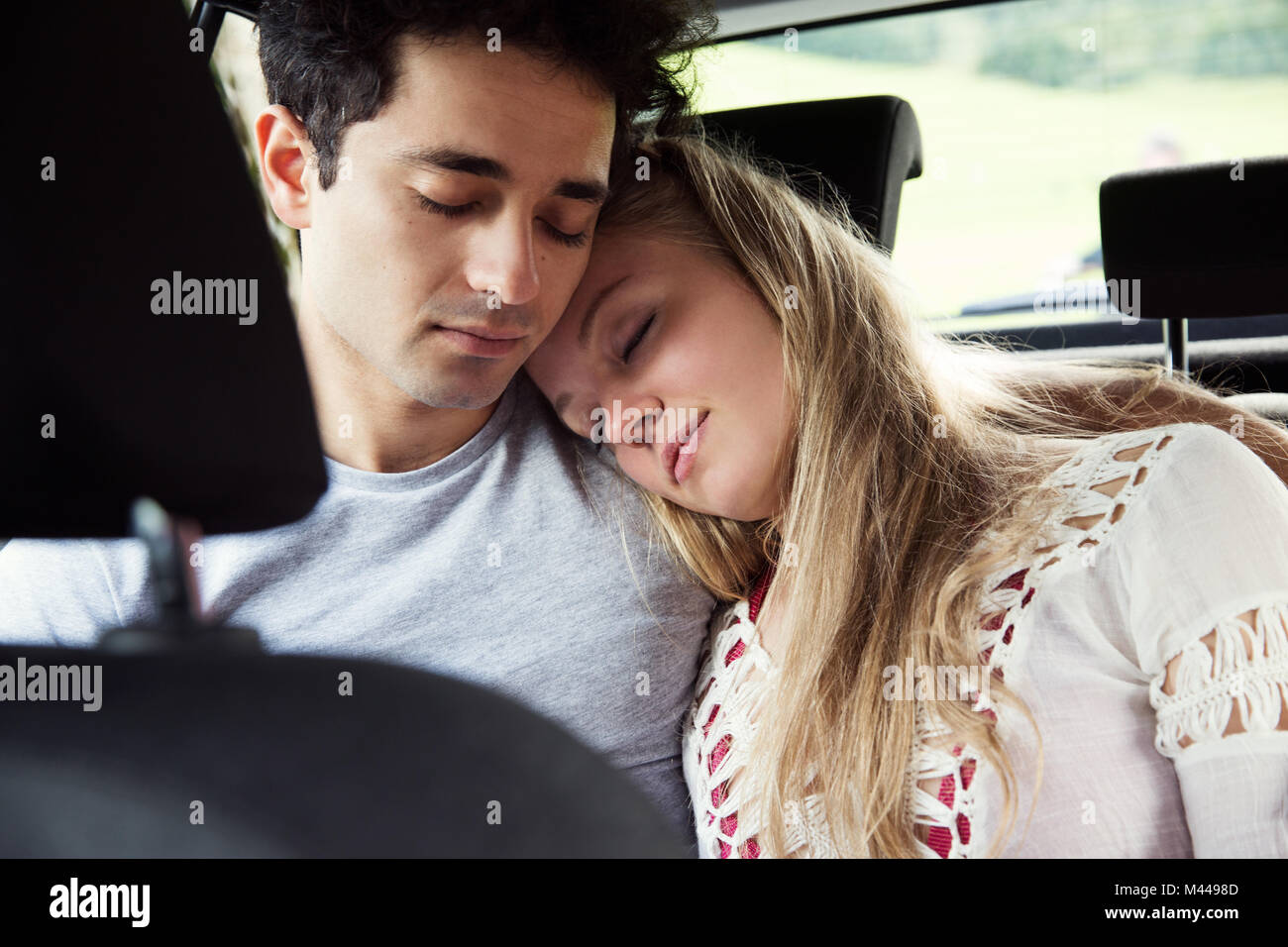 Man woman on backseat car hires stock photography and images Alamy