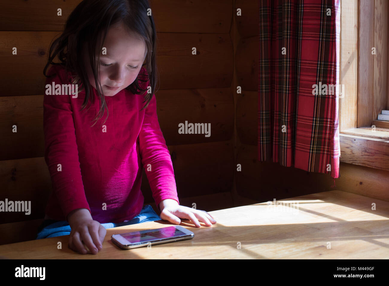 Girl using smartphone Stock Photo