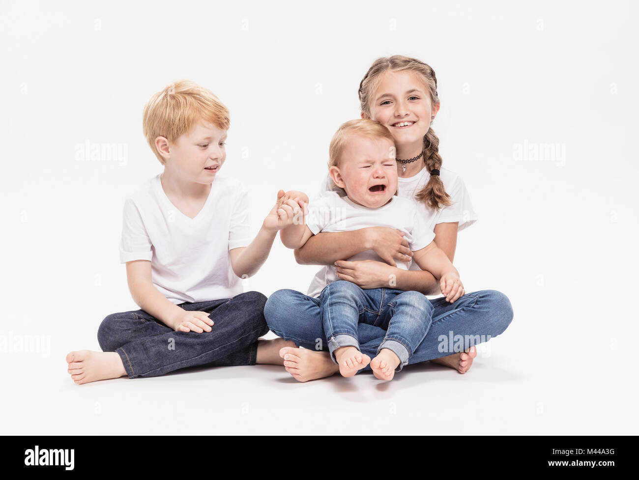 Portrait of brothers and sister Stock Photo