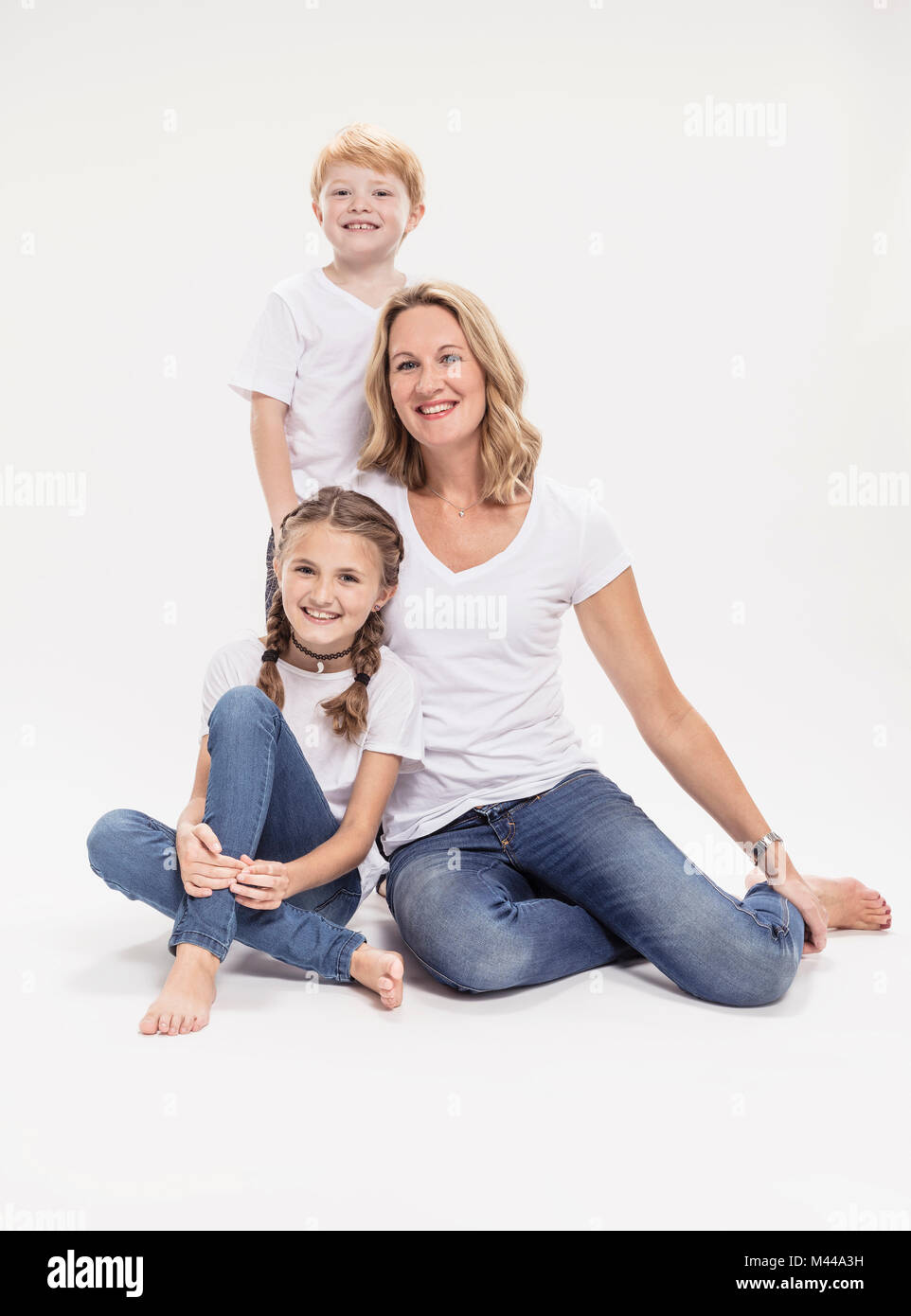 Portrait of mother with daughter and son Stock Photo