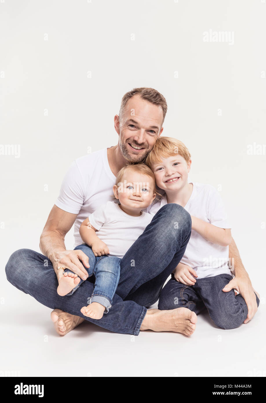 Portrait of father with sons Stock Photo