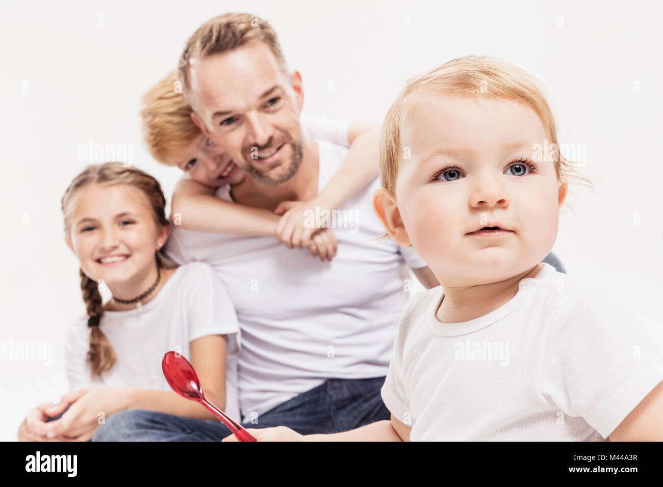 Portrait of father with daughter and sons Stock Photo