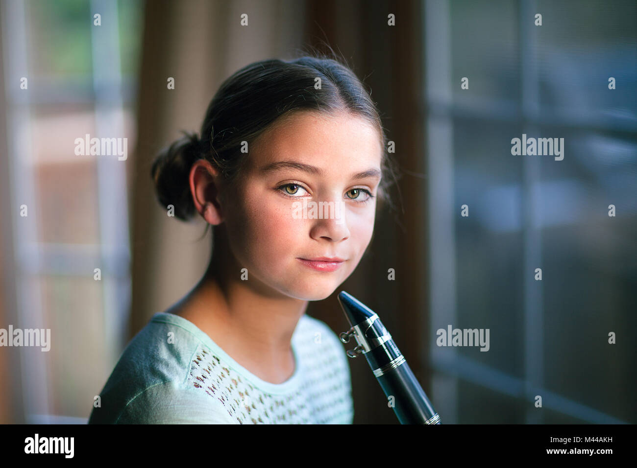 Young clarinettist posing with her clarinet Stock Photo
