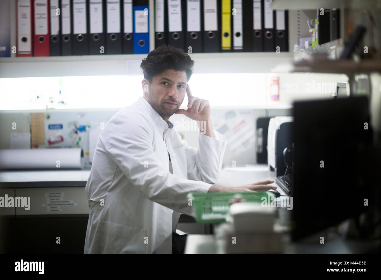 Pharmacist at her desk hi-res stock photography and images - Alamy