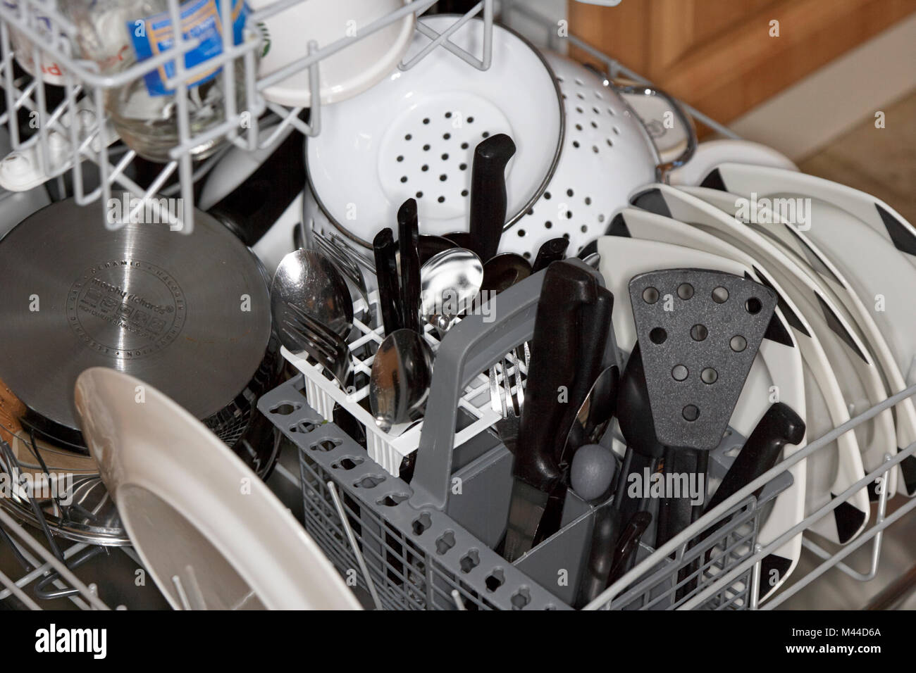 freshly washed and dried dishes in a dishwasher Stock Photo