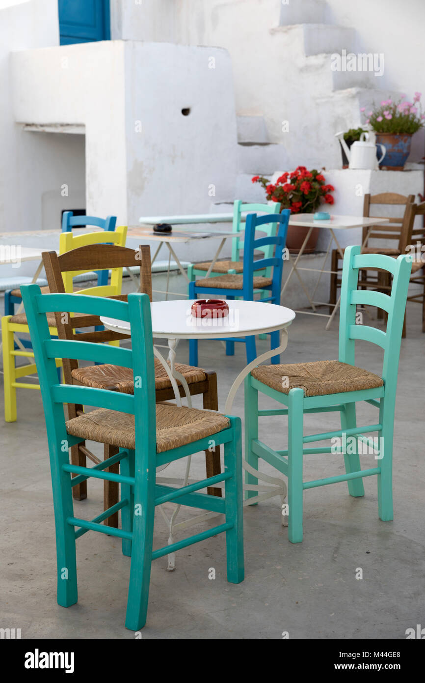 Colourful chairs and tables in typical Greek cafe, Apollonia, Sifnos, Cyclades, Aegean Sea, Greek Islands, Greece, Europe Stock Photo
