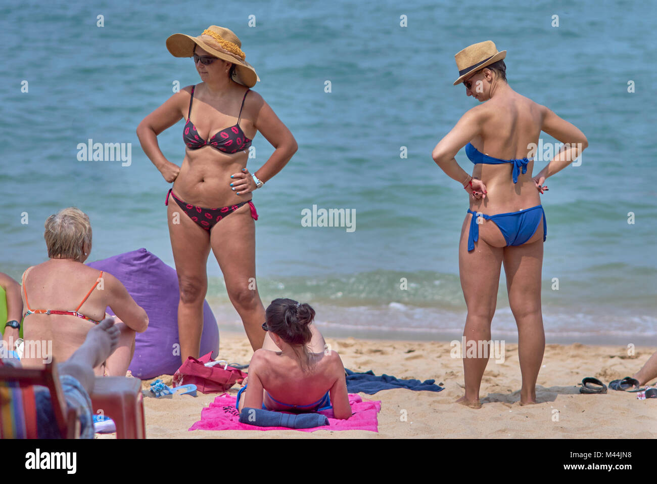 Women bikinis beach. Pattaya Thailand Southeast Asia Stock Photo