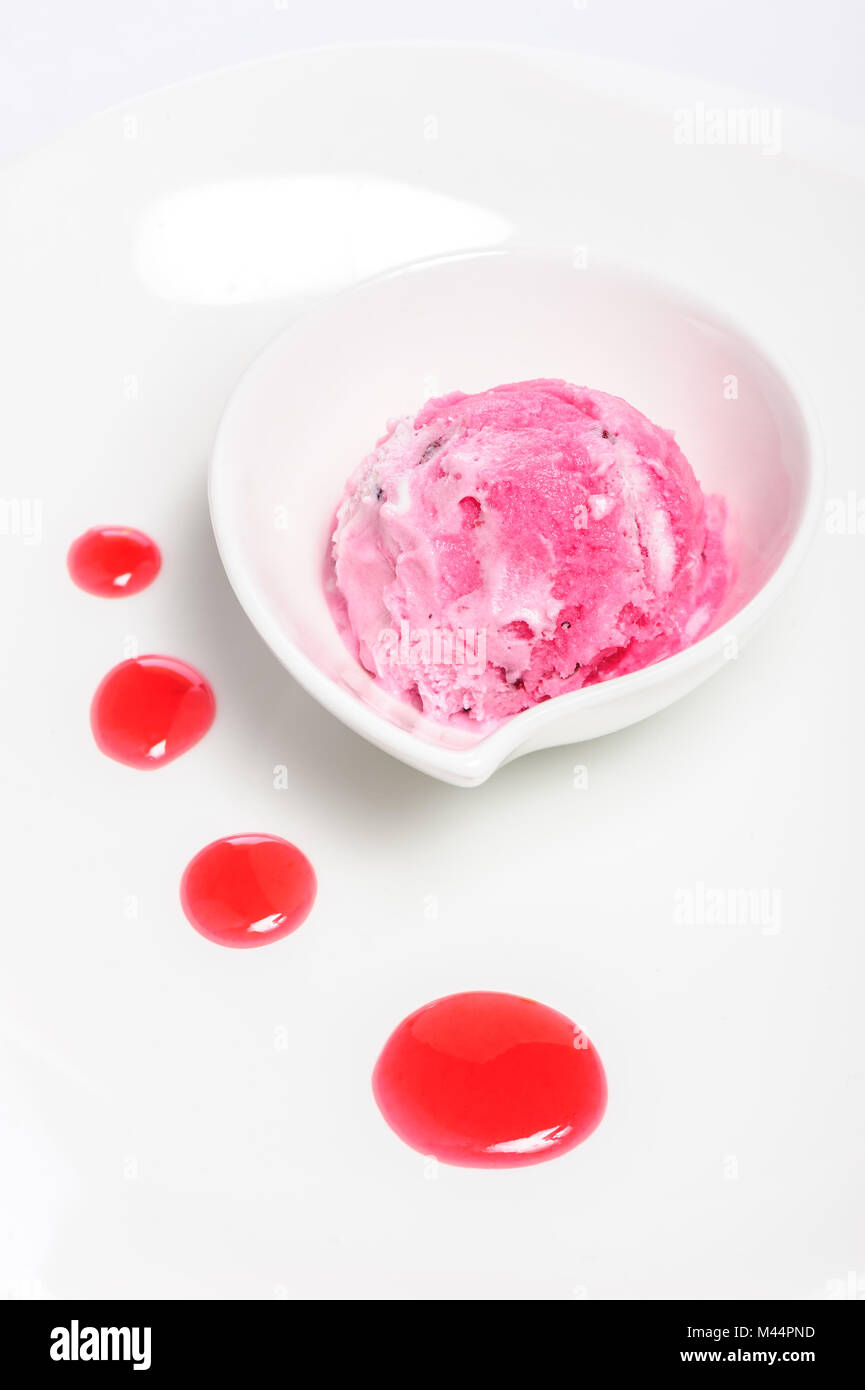 Raspberry cheese cake and ice cream ball Stock Photo