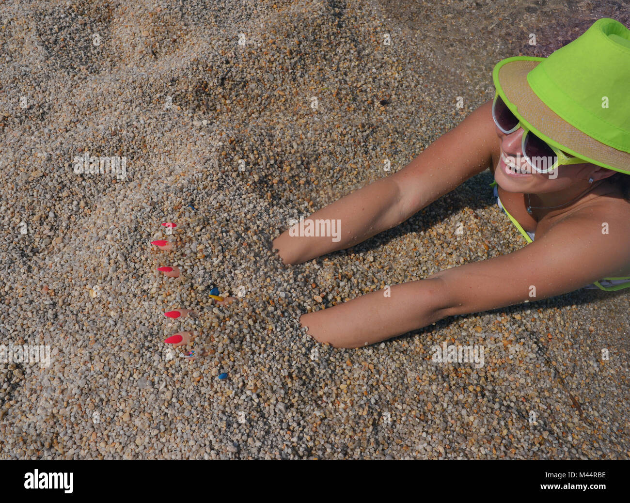 Happy Female Seashore Sand Stock Photo