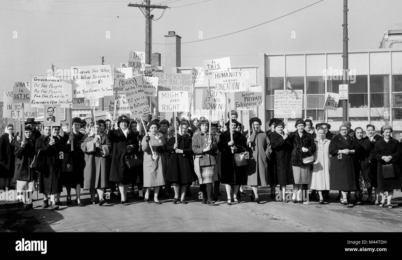 Women protest the development of the University of Illinois displacing their homes in Chicago, ca. 1962. Stock Photo